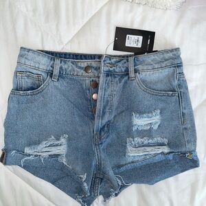 Fashion Nova women’s Denim Blue Distressed Shorts